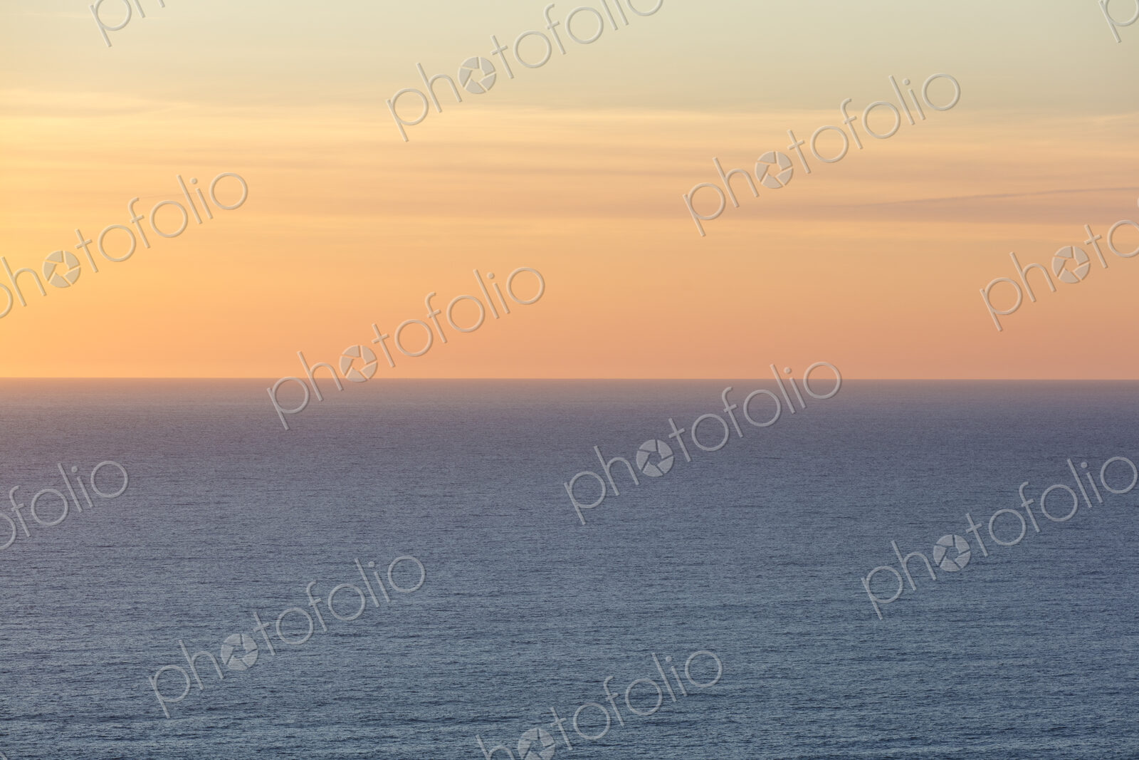 Vast ocean and sky at dusk