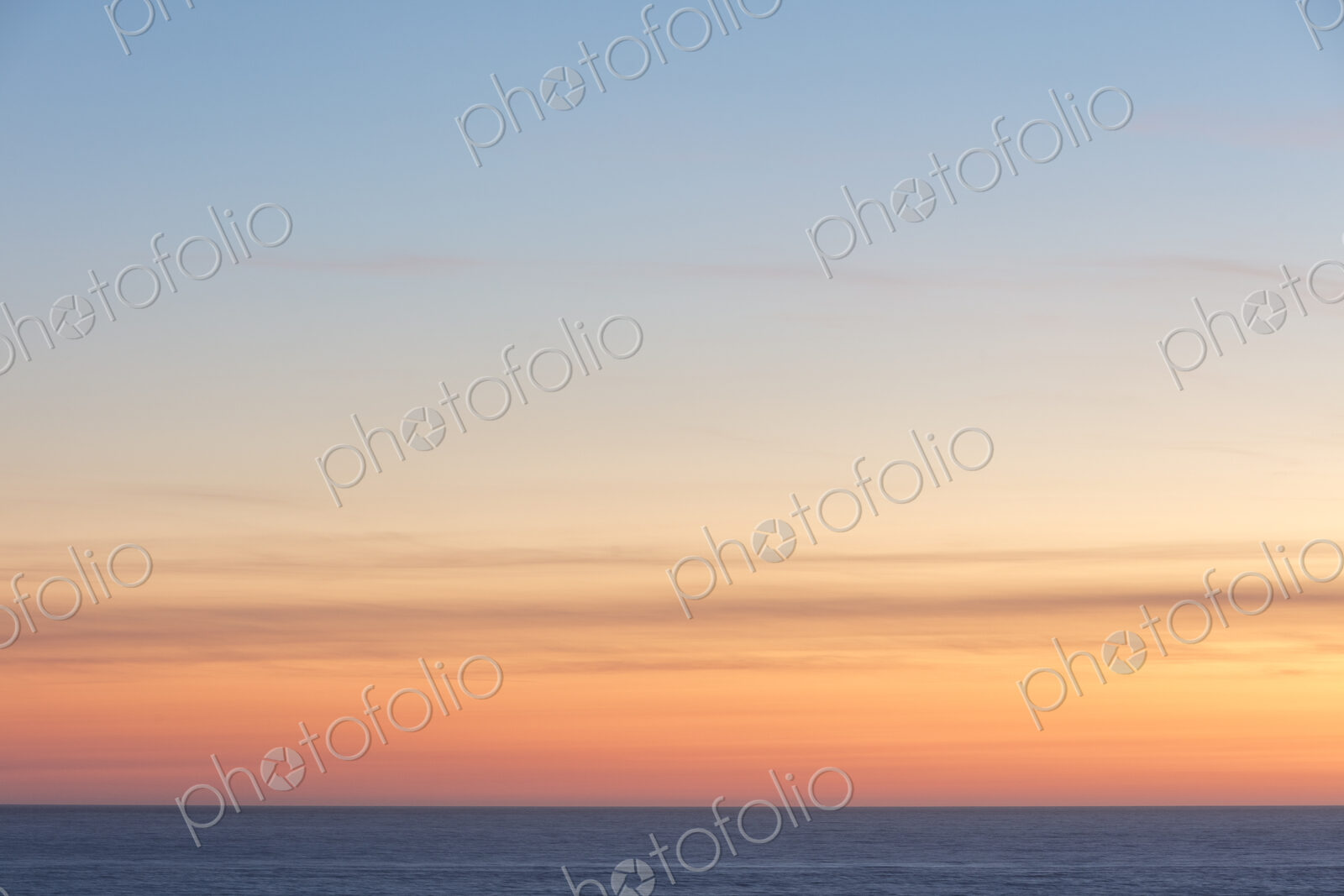 Vast ocean and sky at dusk