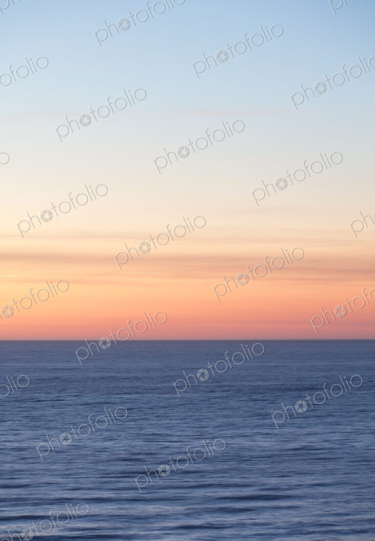 Vast ocean and sky at dusk