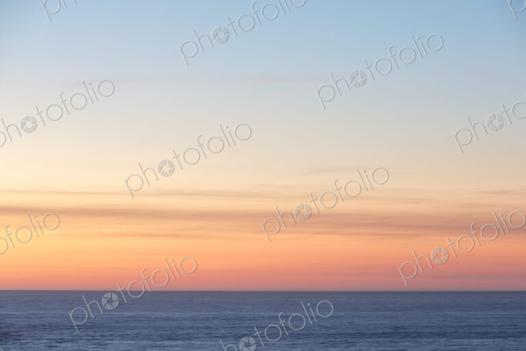 Vast ocean and sky at dusk