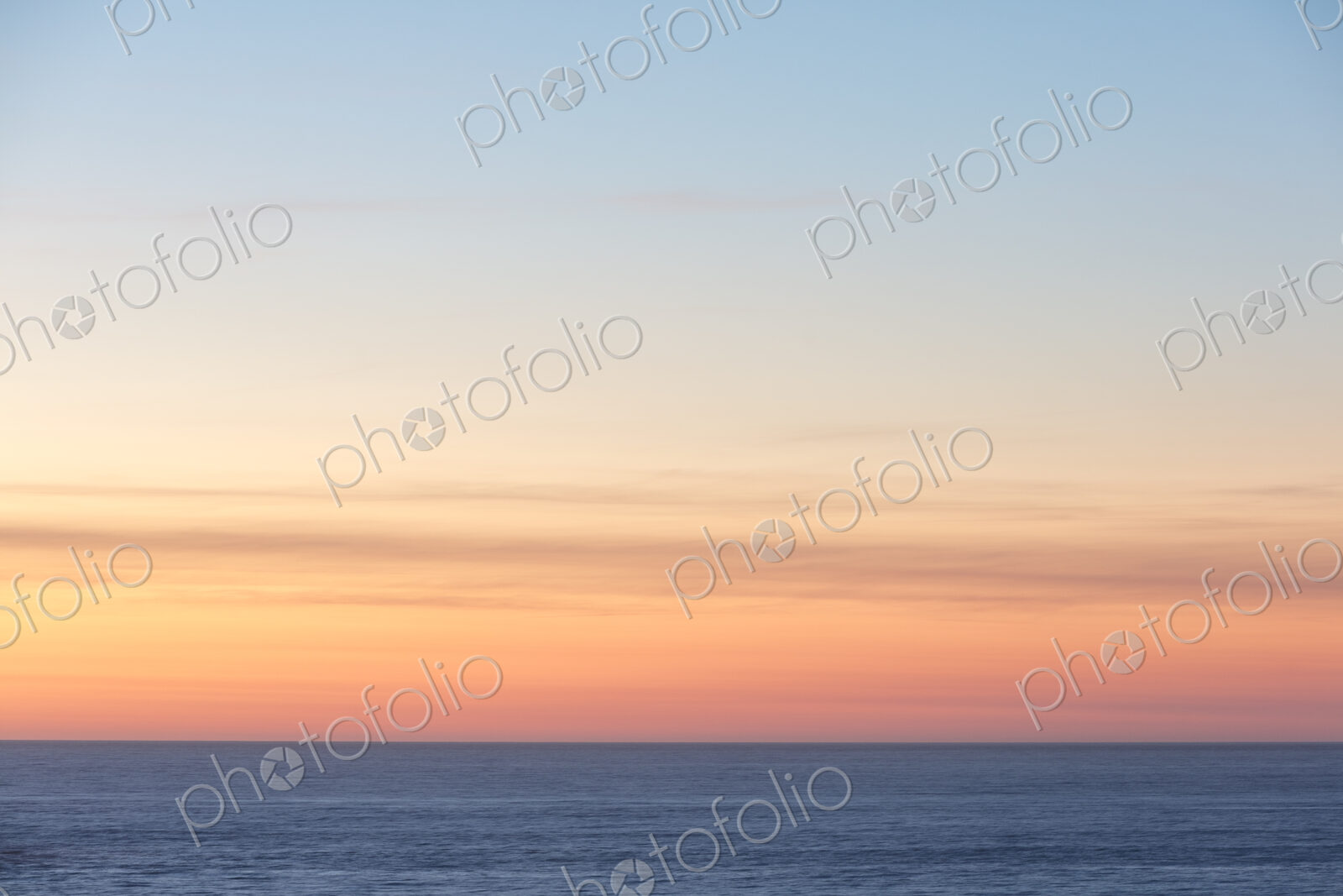 Vast ocean and sky at dusk