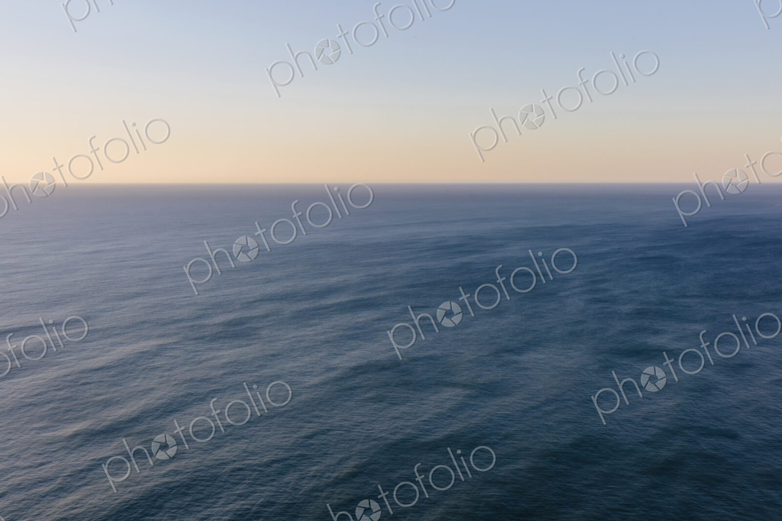 Vast ocean and sky at dusk