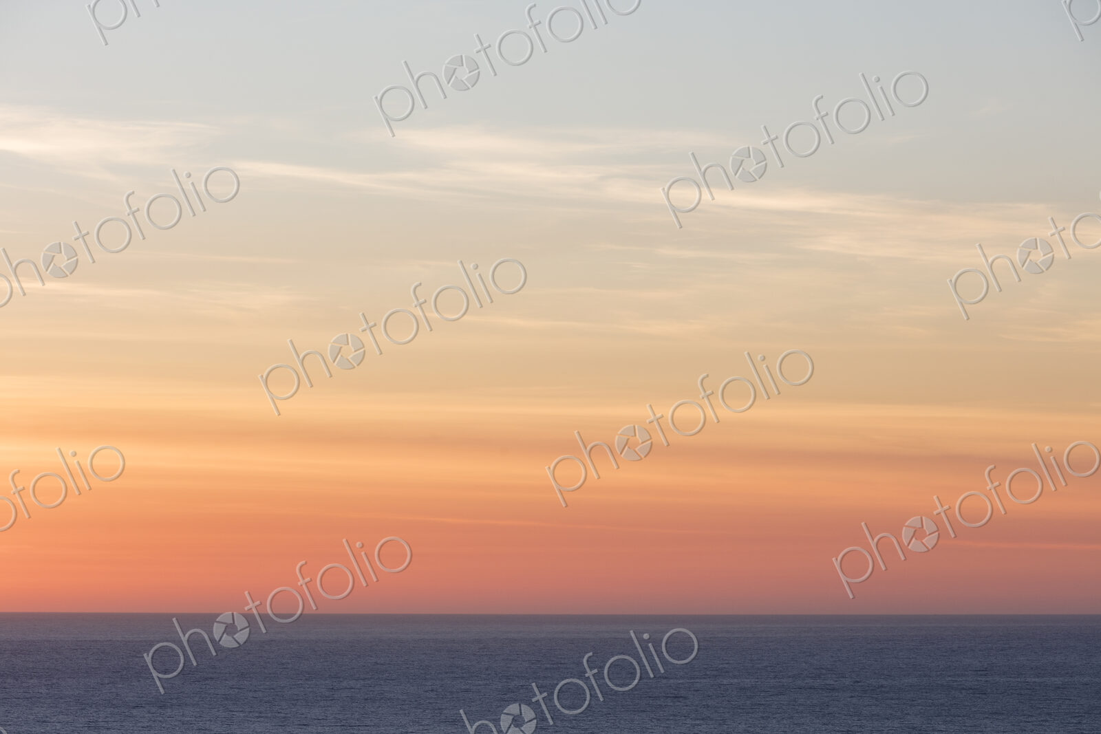Vast ocean and sky at dusk