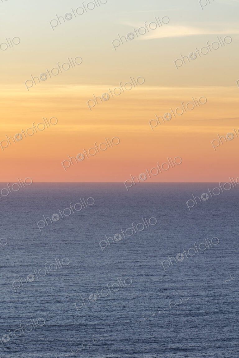 Vast ocean and sky at dusk