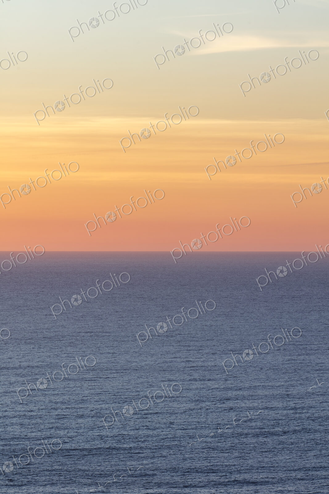 Vast ocean and sky at dusk