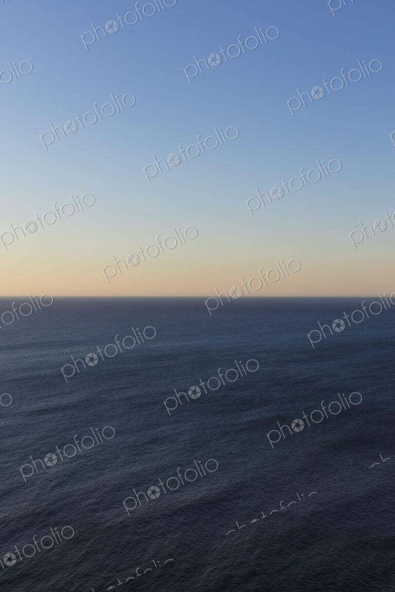Vast ocean and sky at dusk