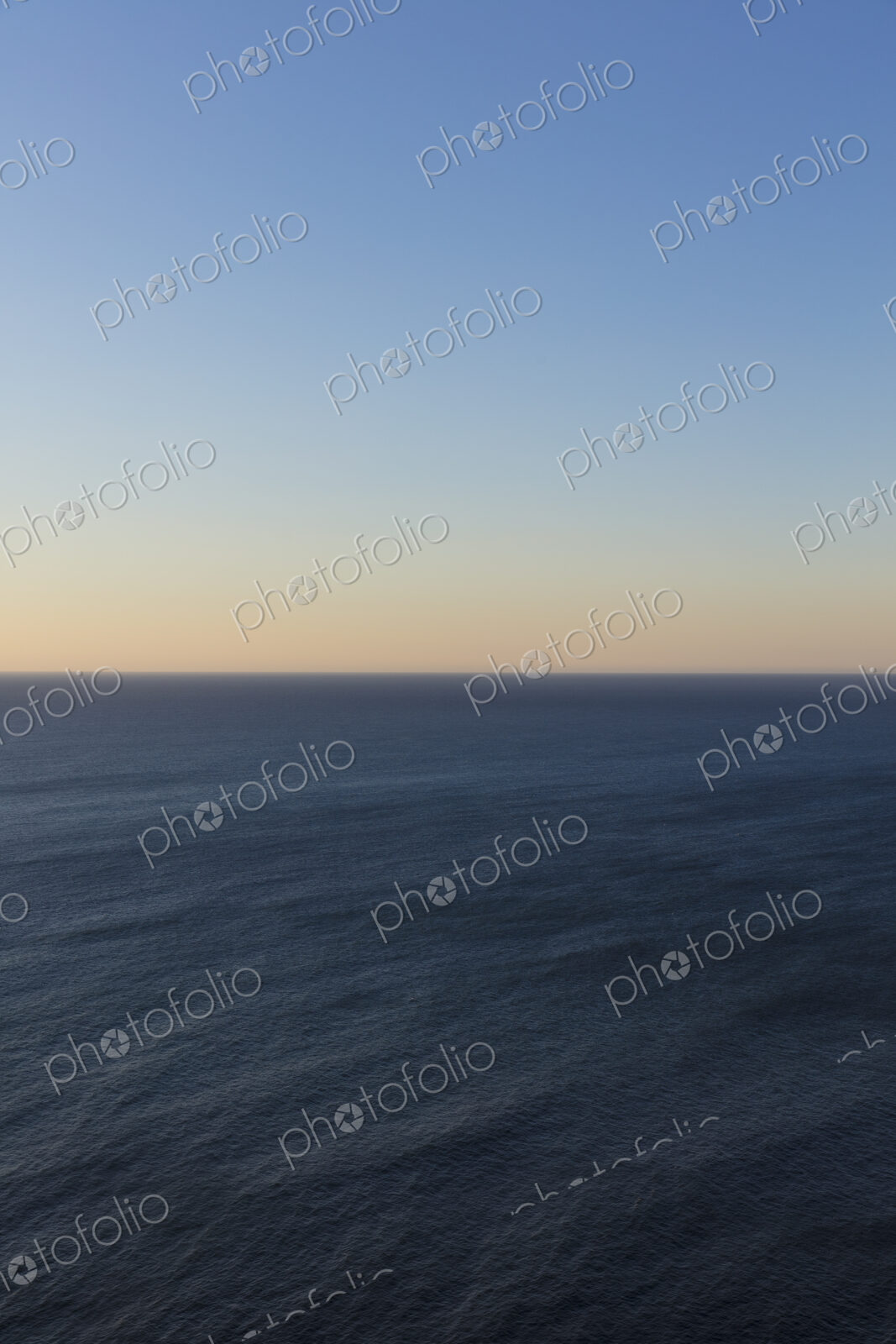 Vast ocean and sky at dusk