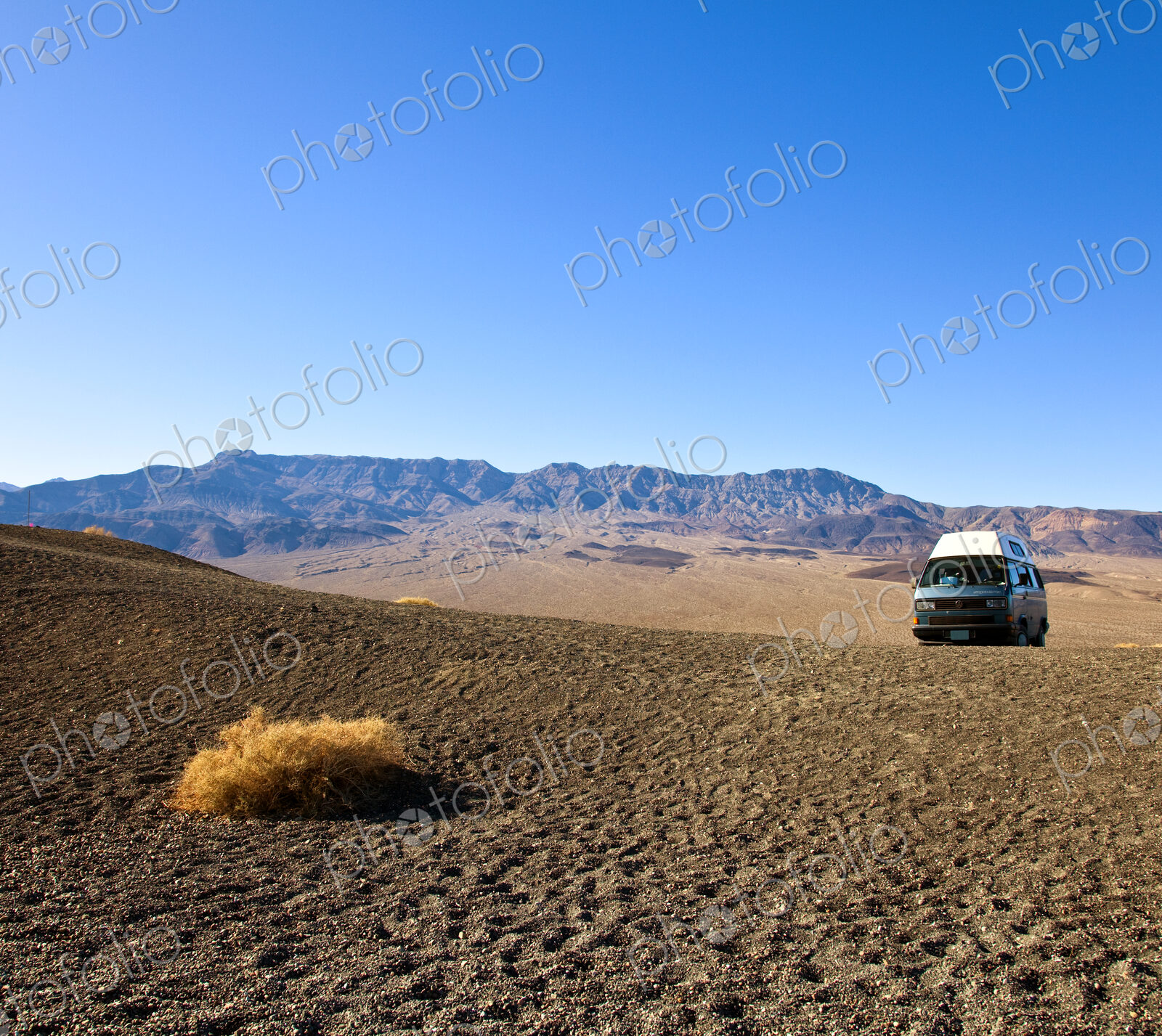 Vehicle in Desert Landscape