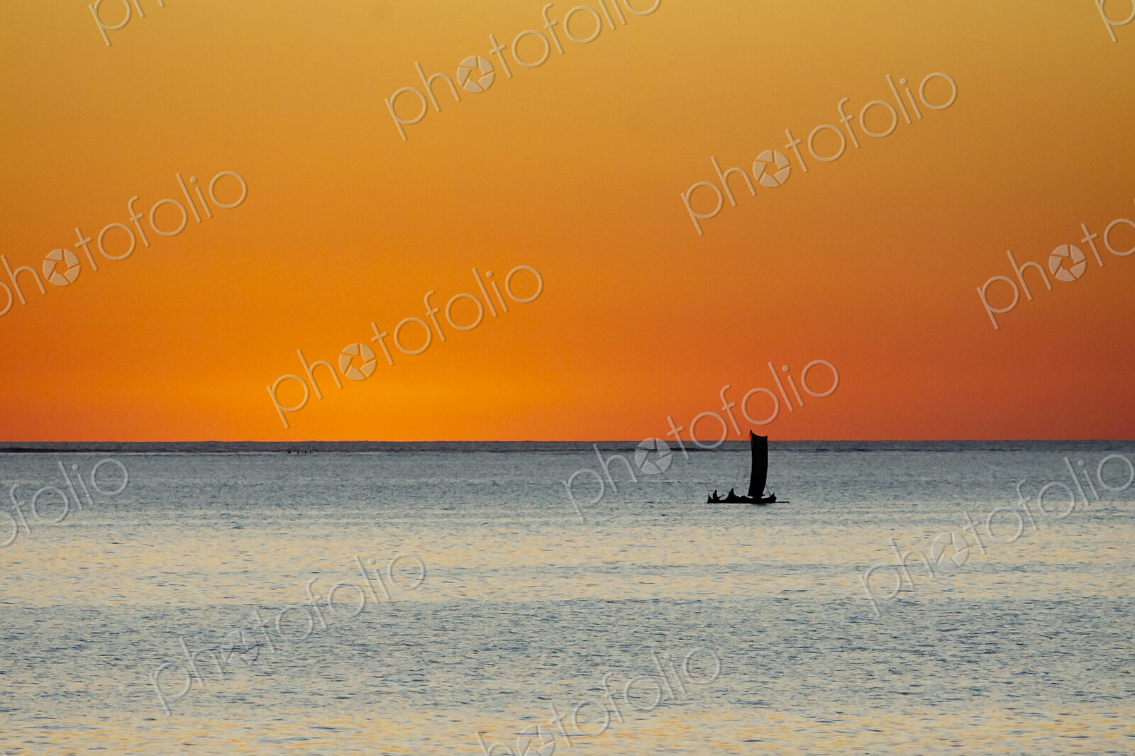 Vezo dugout fishing boat at sunset near Tsifota.