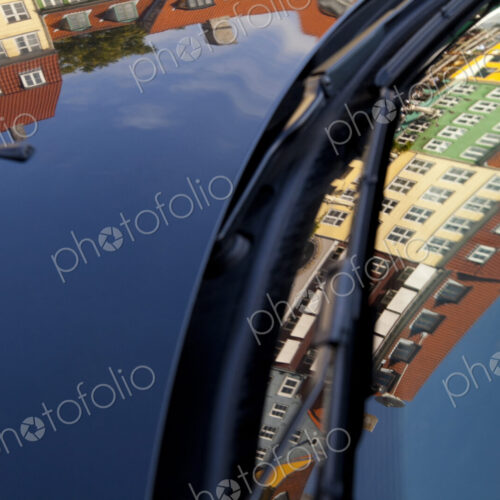 Vibrant apartment buildings reflected in car windshield, Nyhavn, Copenhagen, Denmark