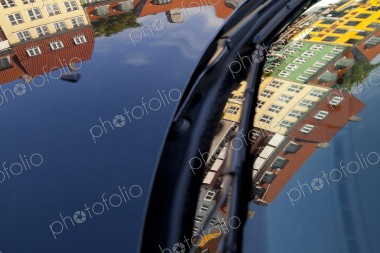 Vibrant apartment buildings reflected in car windshield, Nyhavn, Copenhagen, Denmark
