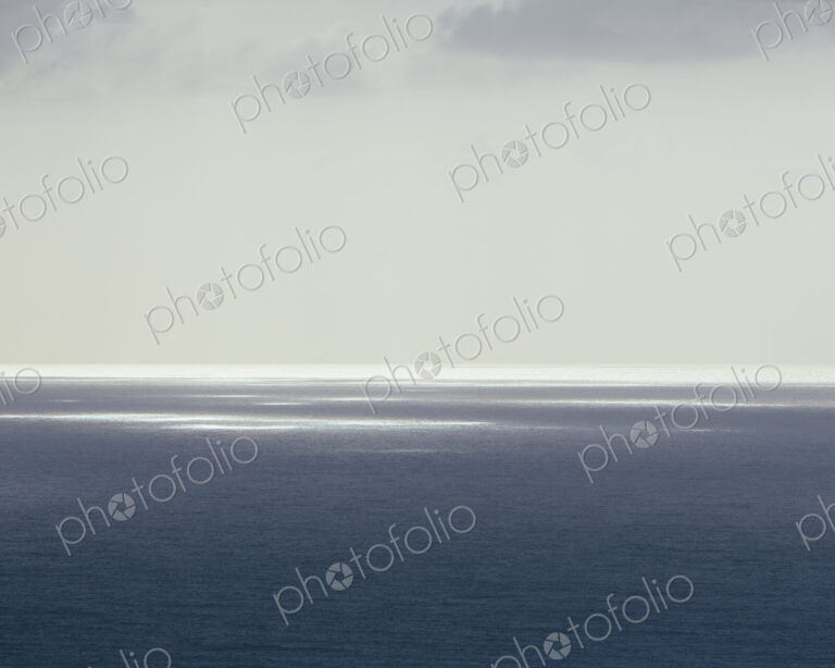 View across the Pacific ocean and a moody sky, at Manzanita in Oregon.