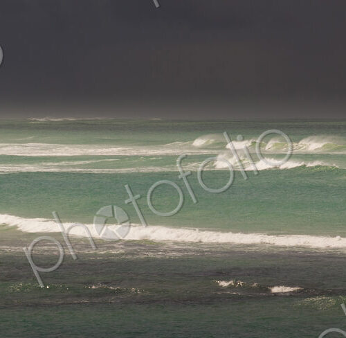 View across the Southern Ocean from Cape Agulhas in South Africa. Waves and stormy seas. View across the Southern Ocean from Cape Agulhas in South Africa. Waves and stormy seas.