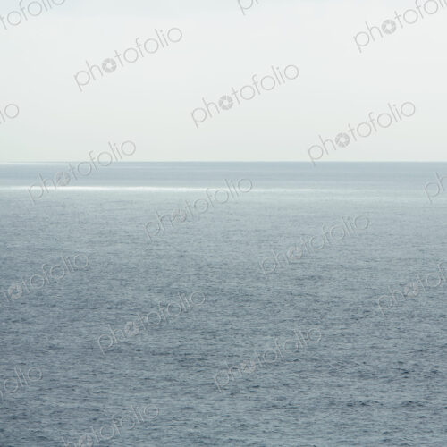 View across the ocean and a cloudy sky at Manzanita in Oregon