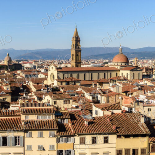 View across the rooftops of Florence, historic renaissance architectural landmarks,…