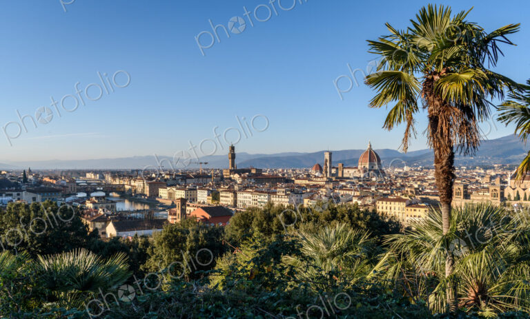 View across the rooftops of Florence, historic renaissance architectural landmarks,…