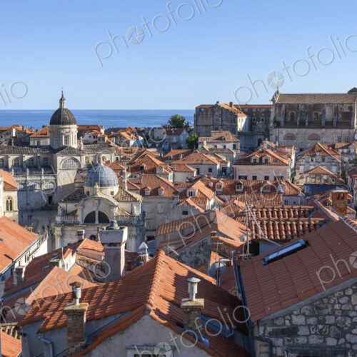 View across the rooftops of the historic old town of Dubrovnik, and a view to the… View across the rooftops of the historic old town of Dubrovnik, and a view to the…