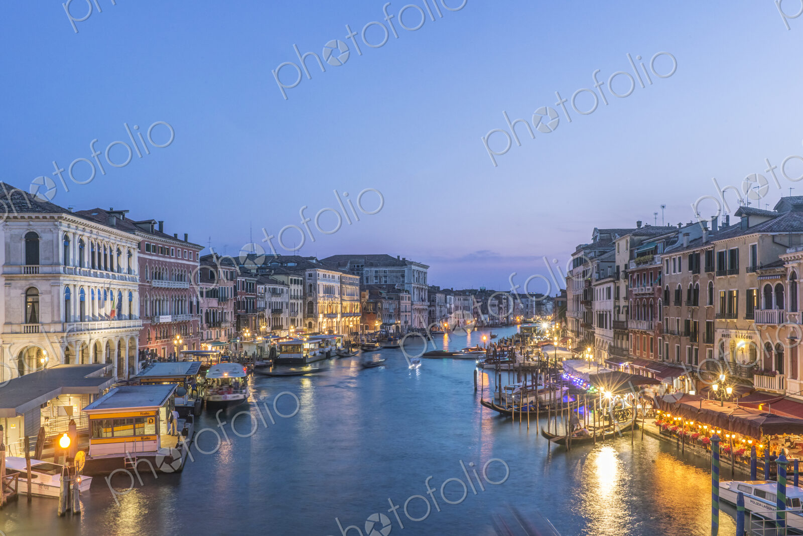 View at sunset, the Grand Canal and palazzos, historic renaissance architecture,…