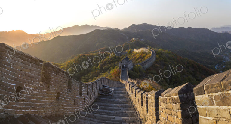 View down steps of the Great Wall, Mutianyu, Beijing, China, with mountain landscape…