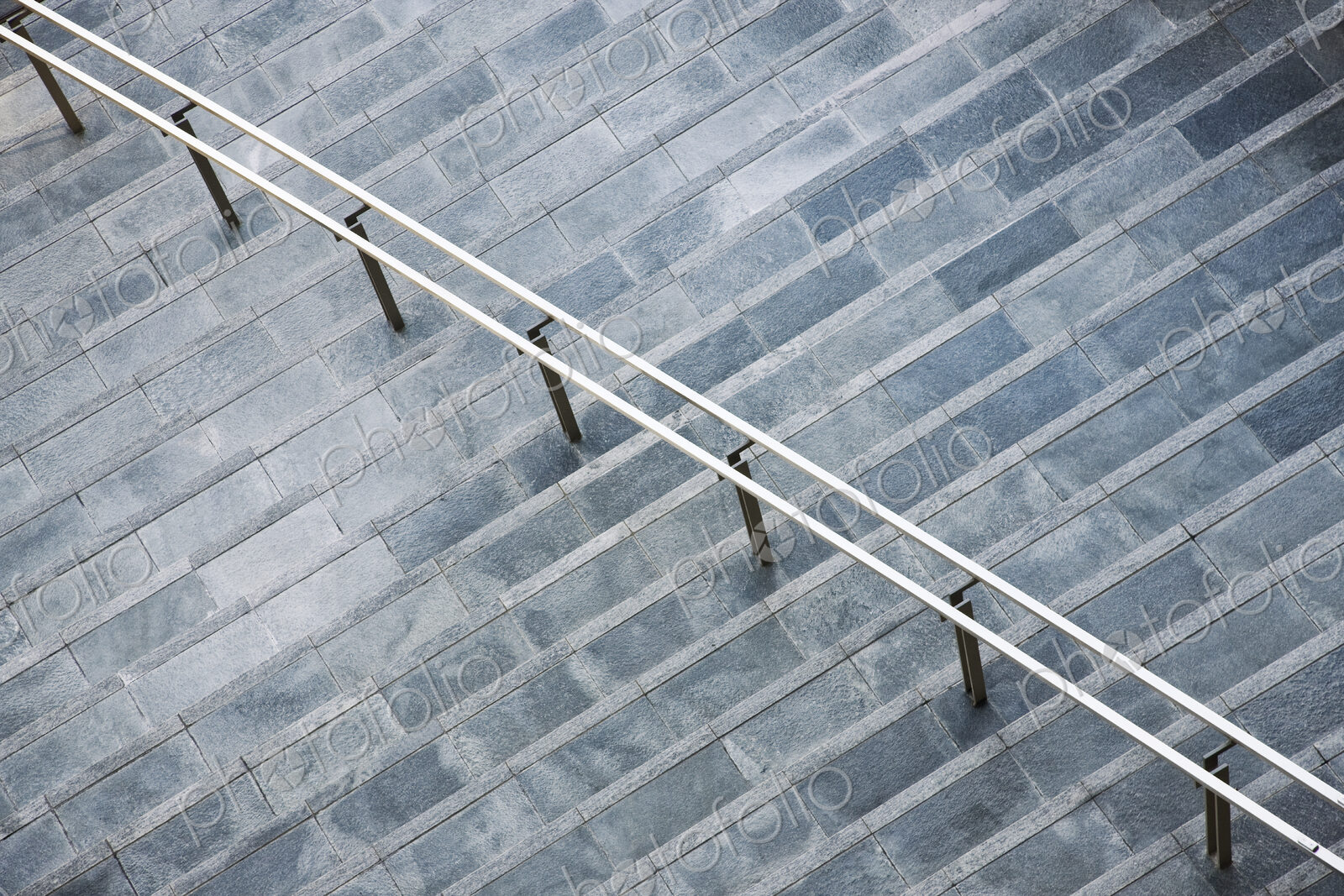 View from above looking down on a series of steps up to an office buidling.