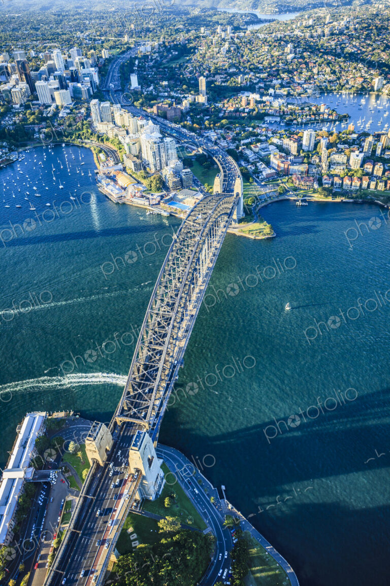 View from above of the Sydney Harbour Bridge and the city of Sydney, downtown and…
