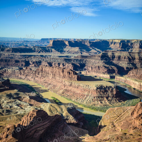 View from above of the messas and rock formations of Canyonlands National Park, and…