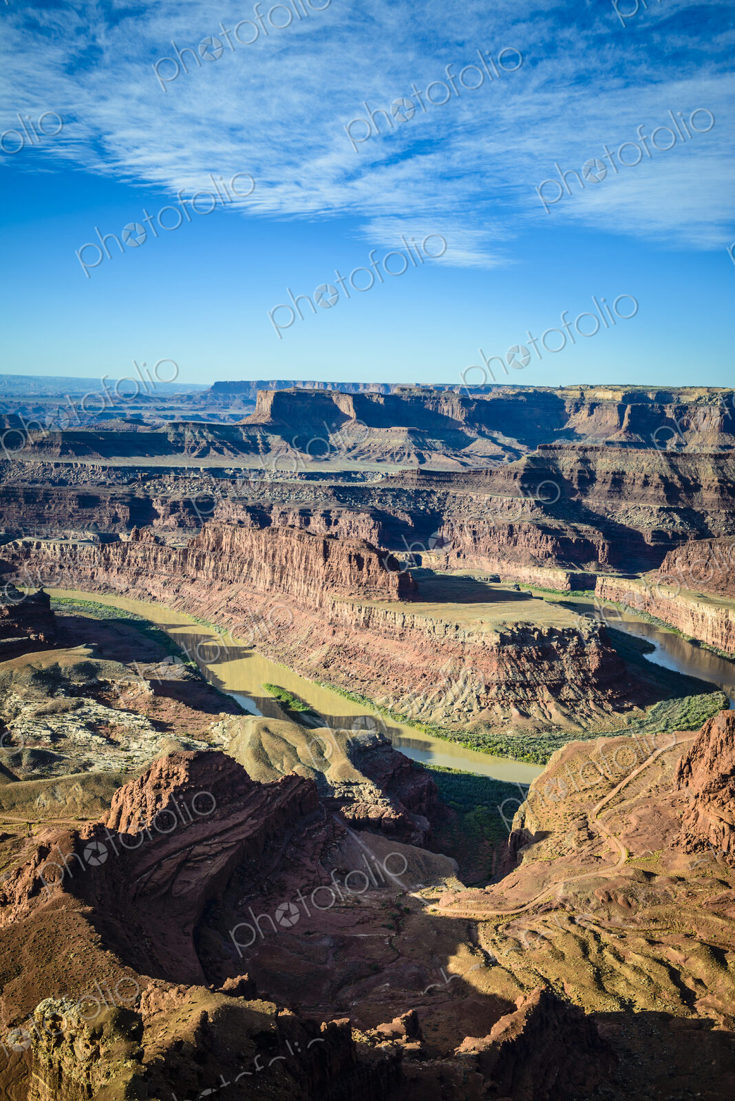 View from above of the messas and rock formations of Canyonlands National Park, and…