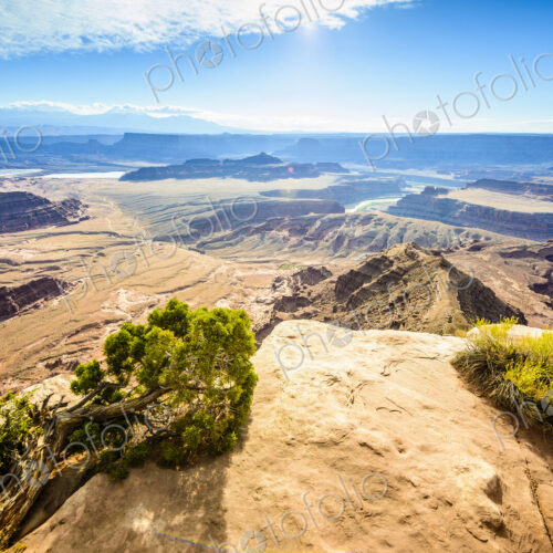 View from above of the messas and rock formations of Canyonlands National Park, and…