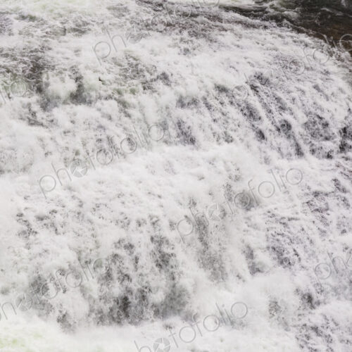 View from above of the torrents of the Spokane Falls, full frame, white water. View from above of the torrents of the Spokane Falls, full frame, white water.