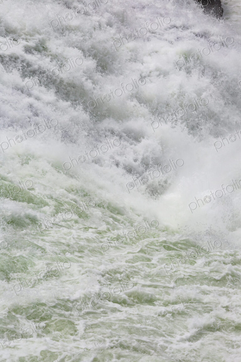 View from above of the torrents of the Spokane Falls, full frame, white water.