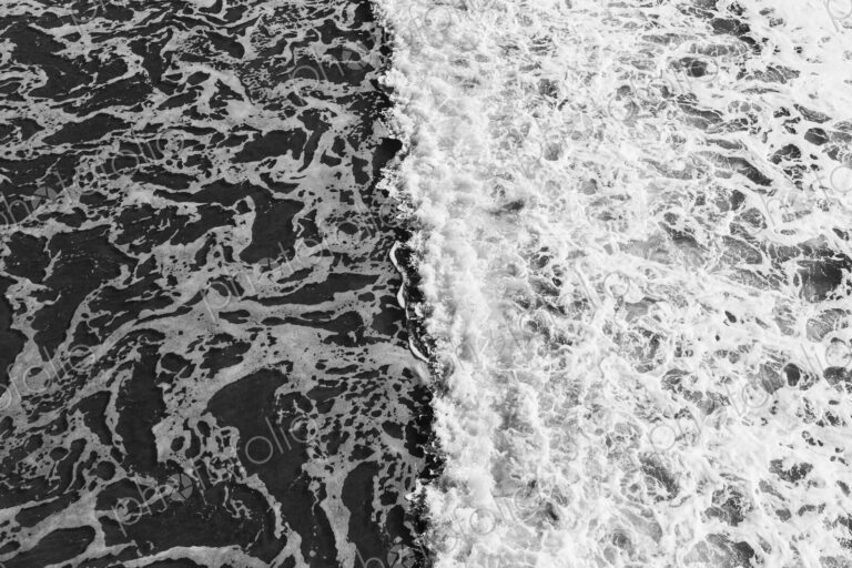 View from above on the waters, waves and incoming surf, near Big Sur on the California…