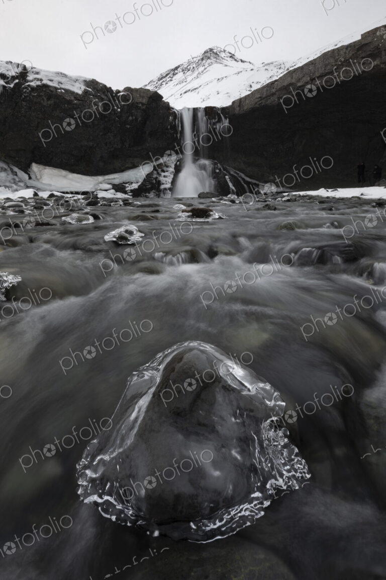 View from downriver of the Skokafoss waterfall, cascading down a cliff, low angle view…