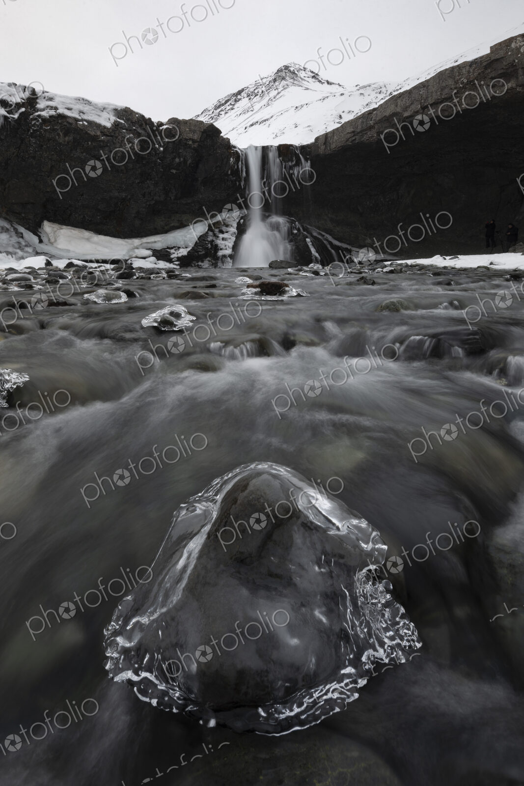 View from downriver of the Skokafoss waterfall, cascading down a cliff, low angle view…