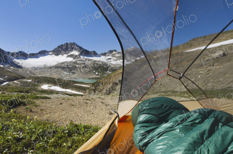 View from inside a tent of Russell Peak and Limestone Lakes Basin in…
