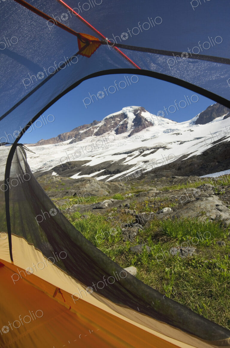 View from tent under snowy mountainside