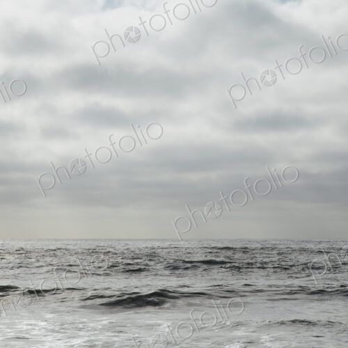 View from the beach over the water, to the horizon, and the seascape at dusk View from the beach over the water, to the horizon, and the seascape at dusk