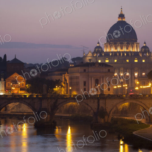 View from the river Tiber towards St. Peter's Basilica in Vatican City, Rome at dusk. View from the river Tiber towards St. Peter's Basilica in Vatican City, Rome at dusk.
