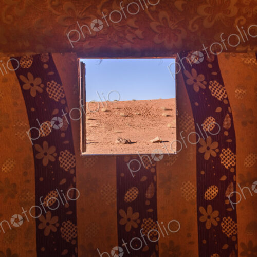 View from window in Bedouin tent in the Wadi Rum desert wilderness in southern Jordan.