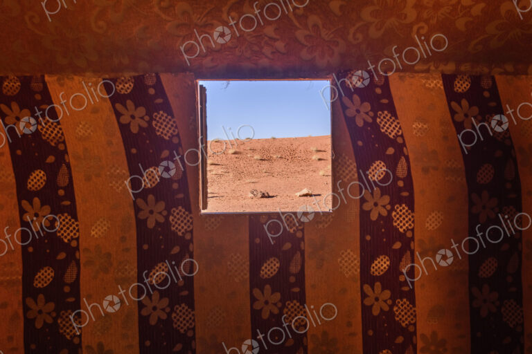 View from window in Bedouin tent in the Wadi Rum desert wilderness in southern Jordan.