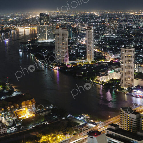 View of Chao Phraya River and the city centre at night, Bangkok, Thailand. View of Chao Phraya River and the city centre at night, Bangkok, Thailand.