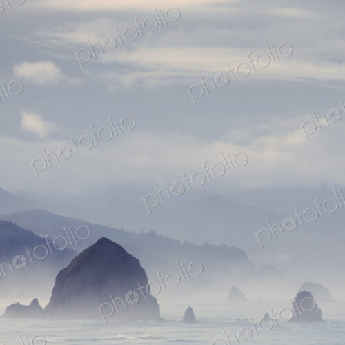 View of Haystack Rock, at Cannon Beach and the coast of the Ecola State Park, Oregon. View of Haystack Rock, at Cannon Beach and the coast of the Ecola State Park, Oregon.