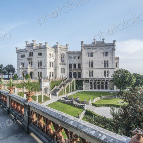 View of Miramare Castle with ocean behind. View of Miramare Castle with ocean behind.