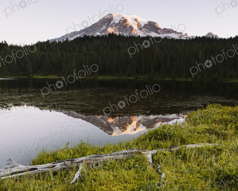 View of Mount Rainier from Reflection Lakes at dawn in Mount Rainier national park.
