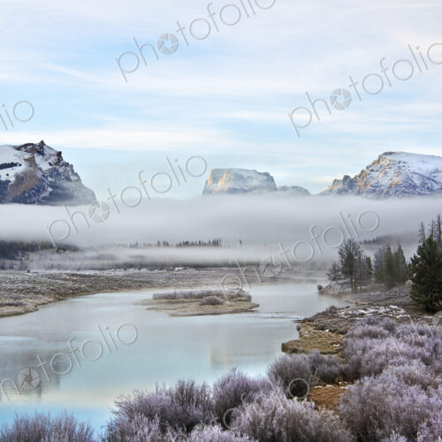 View of Squaretop Mountain, and the Wind River, at dawn, with low hanging mist over…