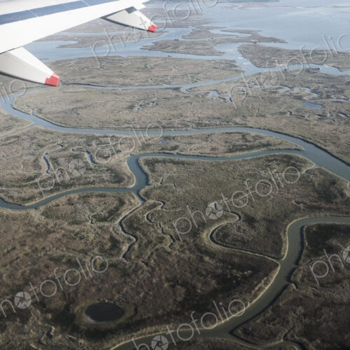 View of Venice, Veneto, Italy from a passenger plane window.