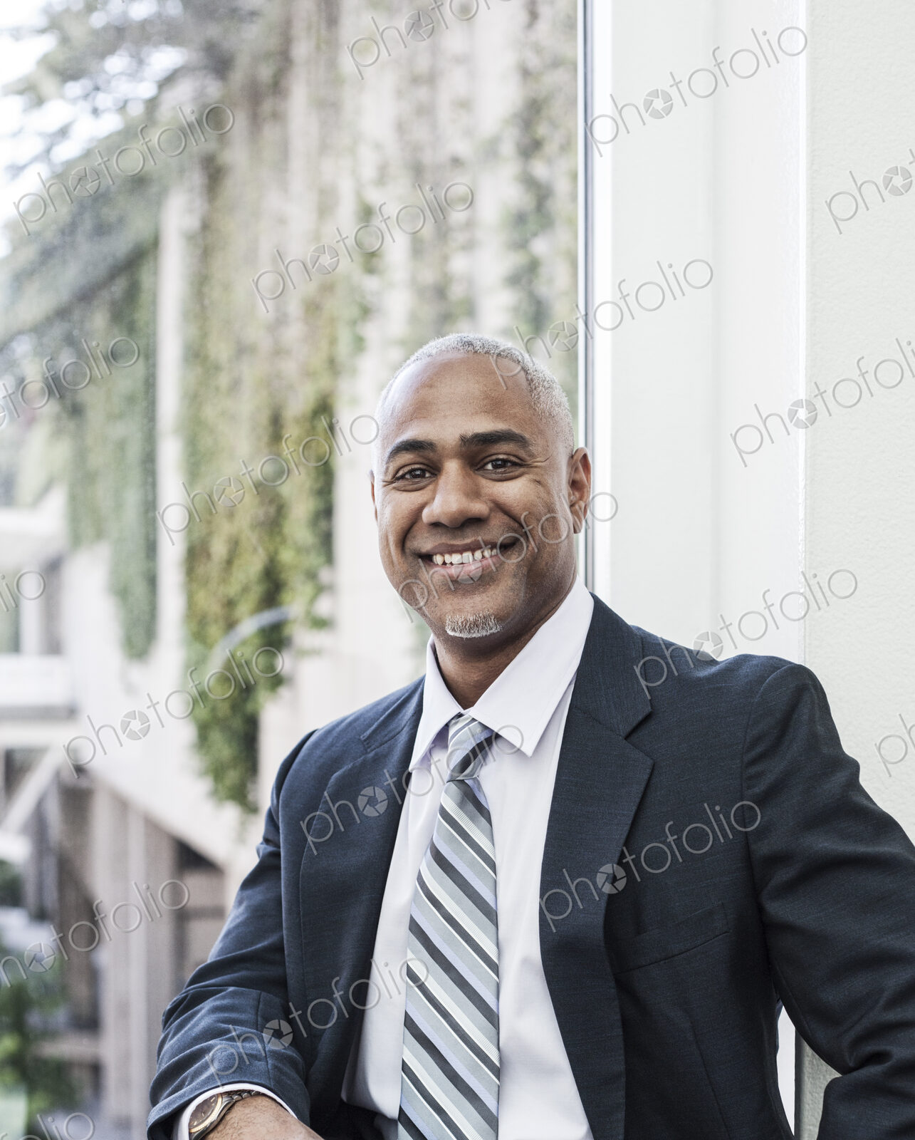 View of a black business man in a shirt and tie.
