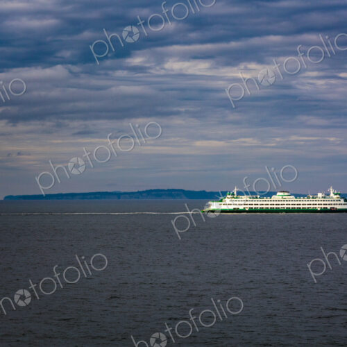 View of a passenger ferry, a ship on the sea in Puget Sound, Washington View of a passenger ferry, a ship on the sea in Puget Sound, Washington