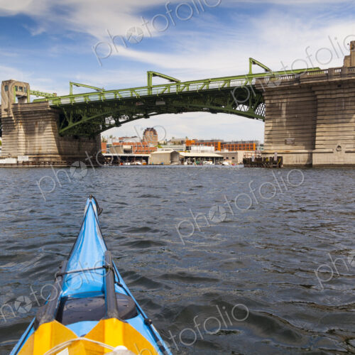 View of a person kayaking near the Ballard Bridge, Seattle,