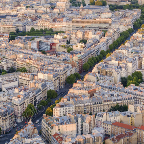 View of boulevard running through Paris residential neighbourhood.