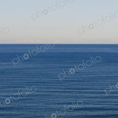 View of expansive ocean, horizon and sky at dusk, northern Oregon coast View of expansive ocean, horizon and sky at dusk, northern Oregon coast